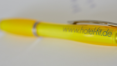 Kugelschreiber mit der Aufschrift www.hotelfit.de.